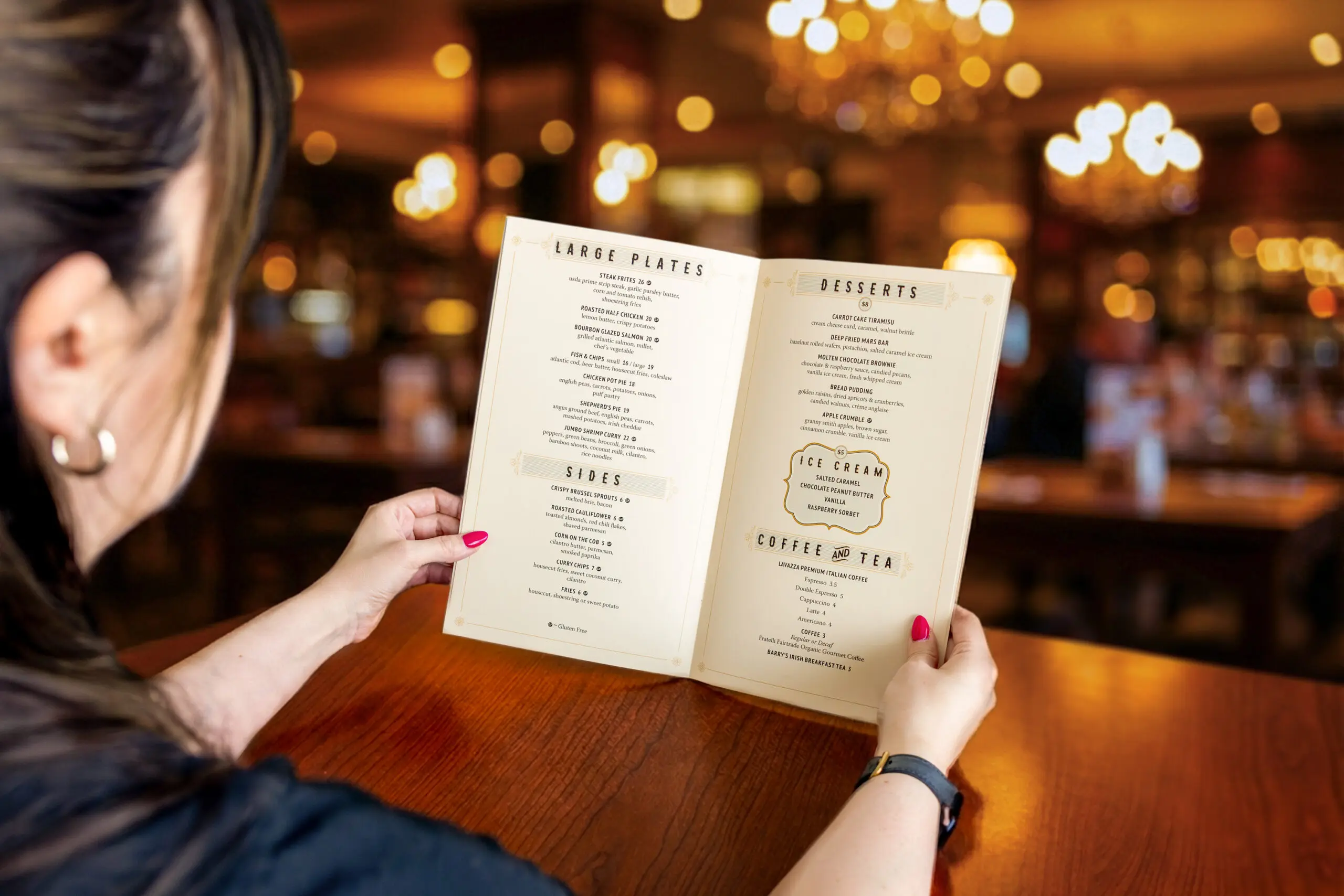 A woman reading a restaurant menu