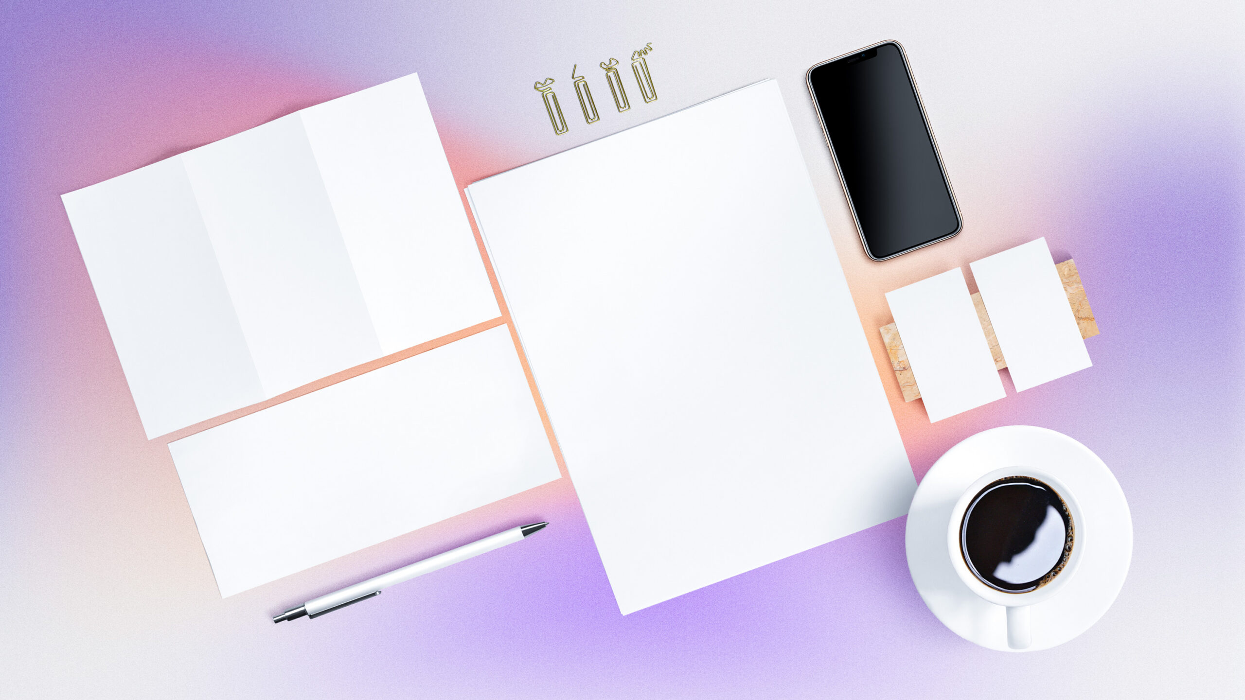 Blank marketing collateral on a purple gradient background