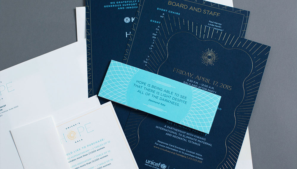 Gold foil UNICEF Hope Gala Invite with belly band