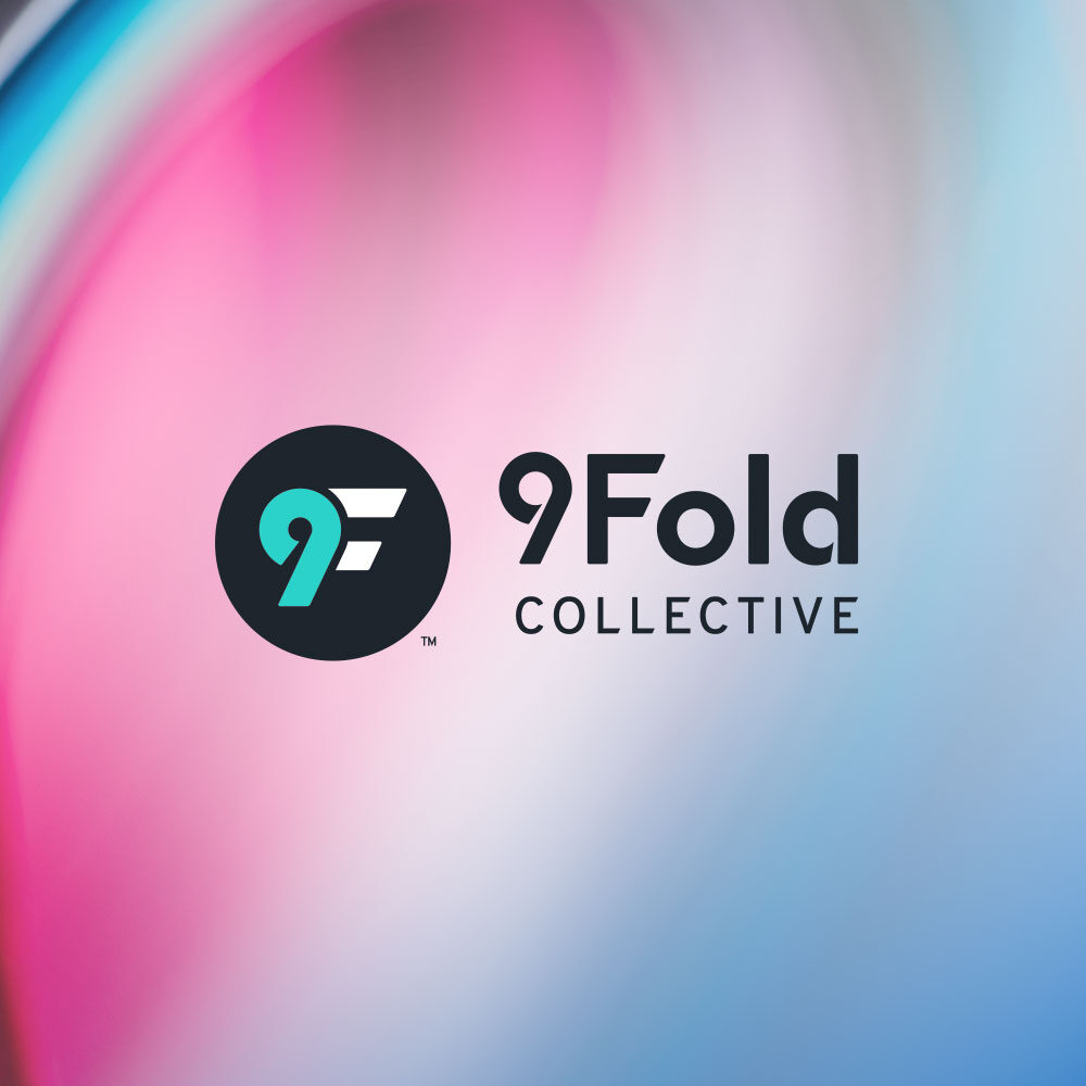 9Fold logo on a photo of folded sheets of colorful stacked paper