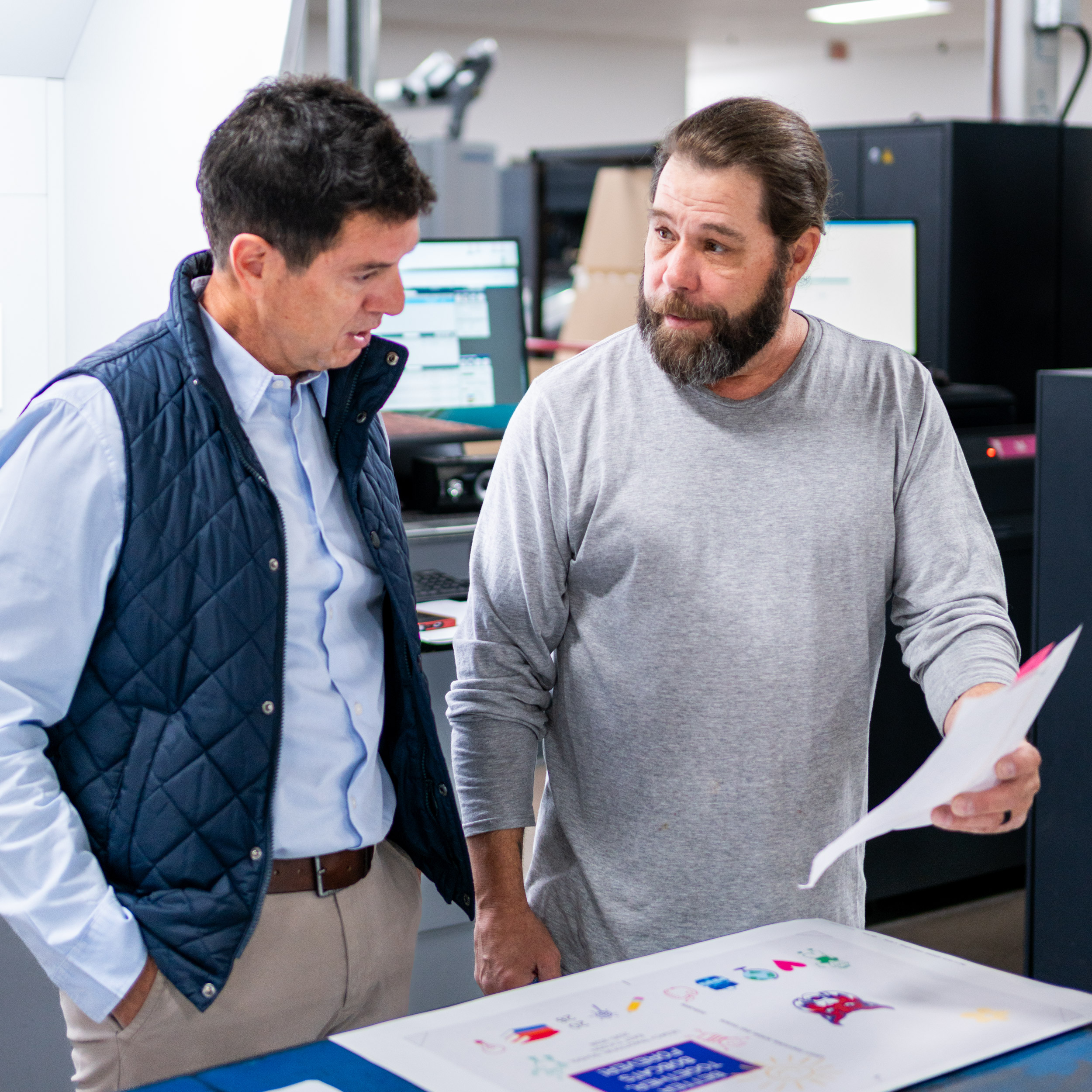 Simon meeting with a production employee square