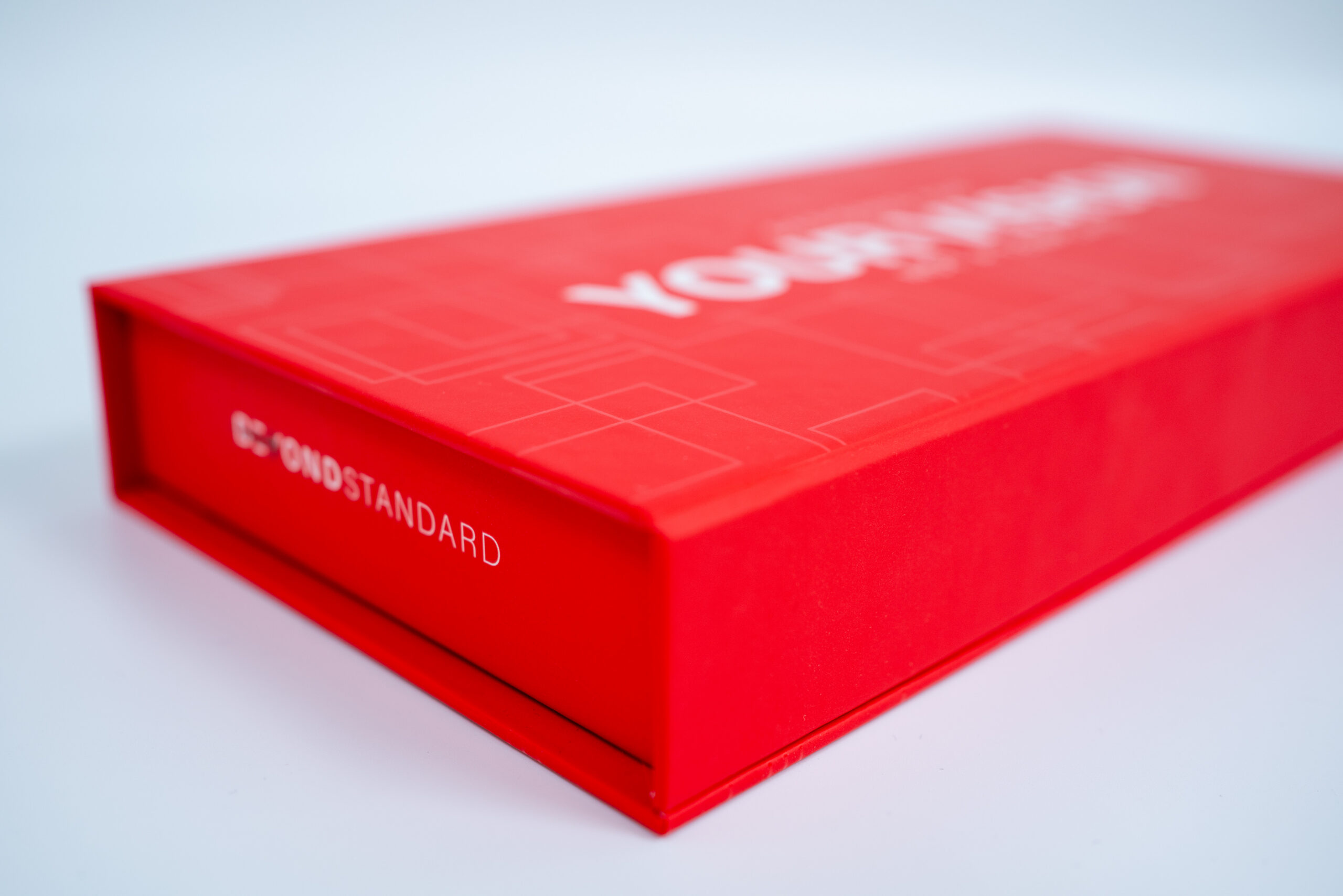 beyond Standard red packaging box