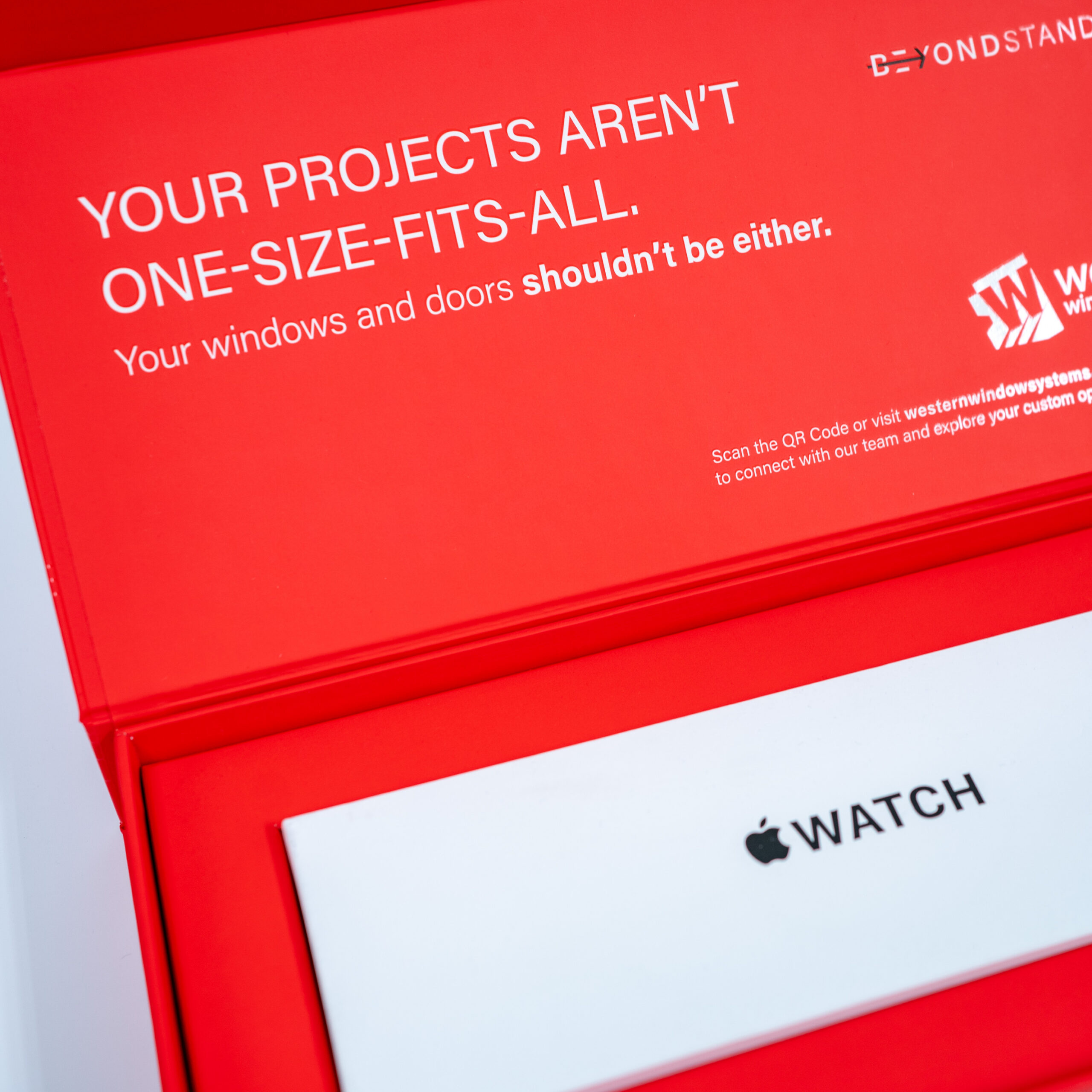 Beyond Standard opened red packaging with Apple Watch