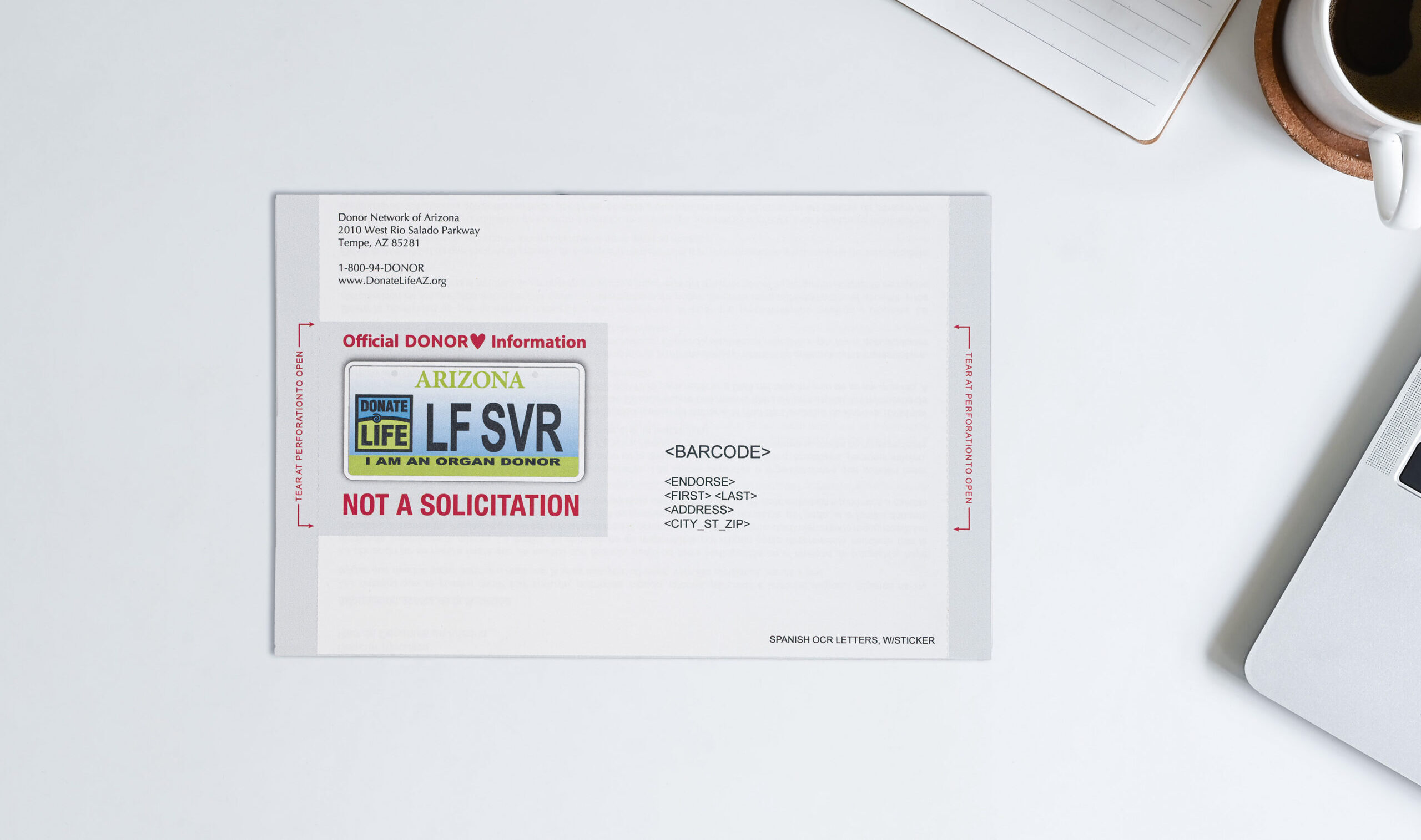 Donor Network mailer laying flat on white tabletop