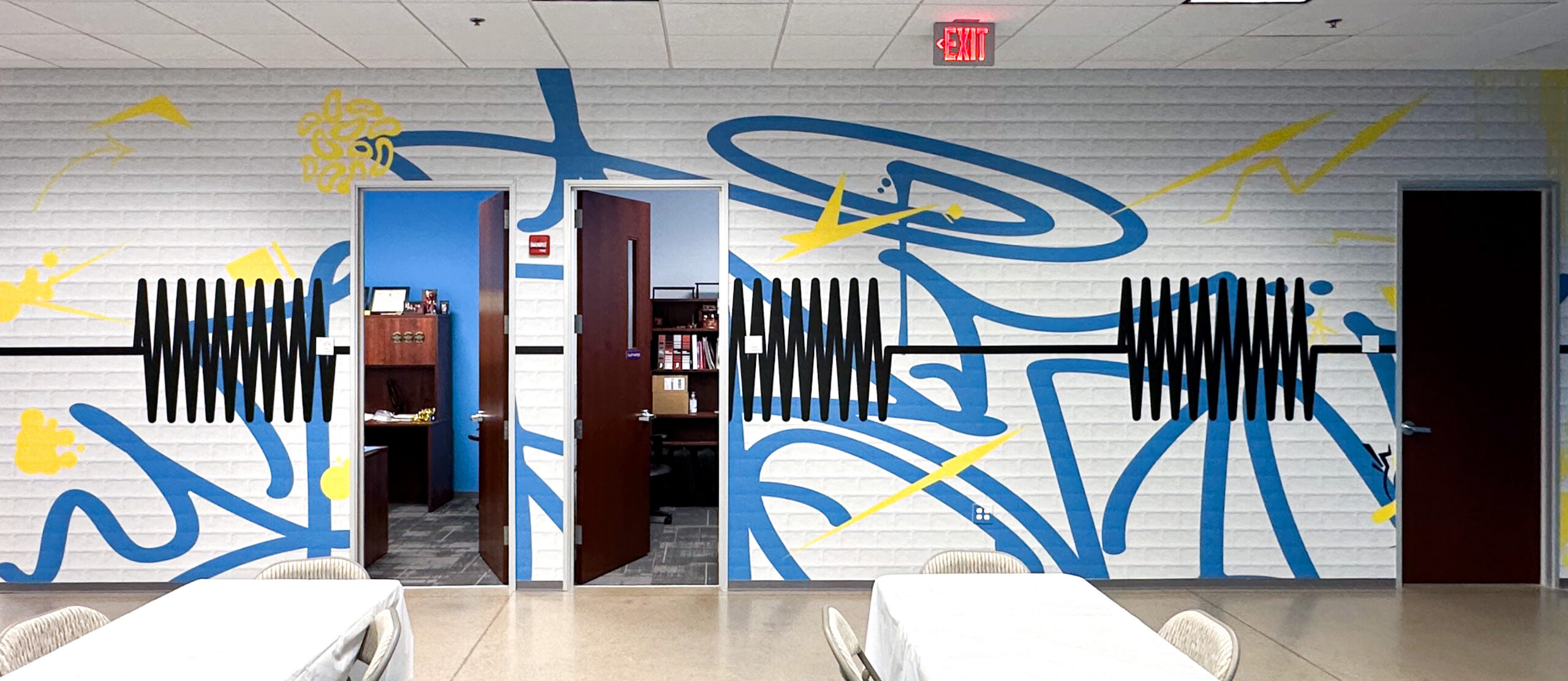 Regenesis graffiti-style wall graphics