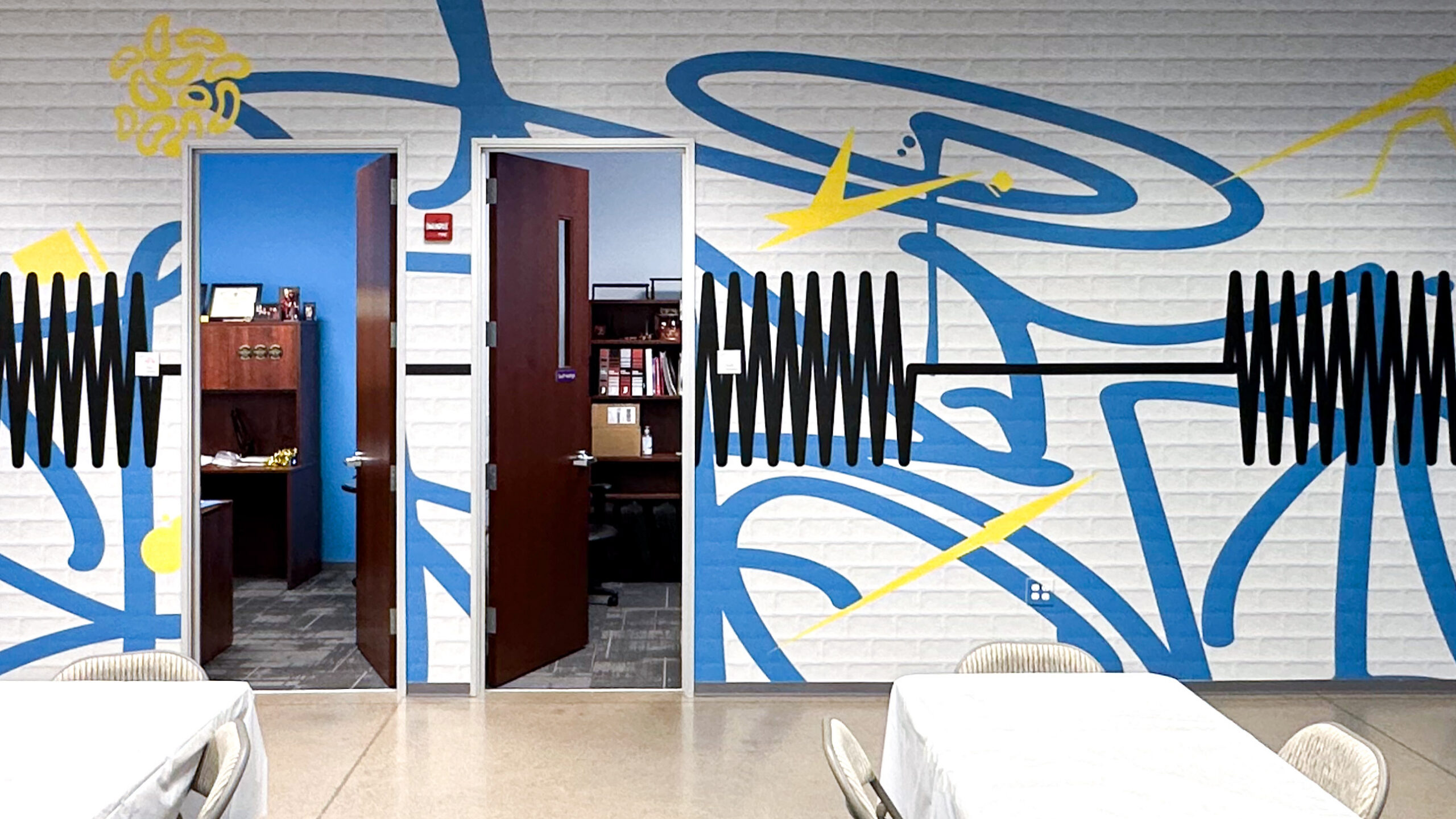 Regenesis graffiti-style wall graphics