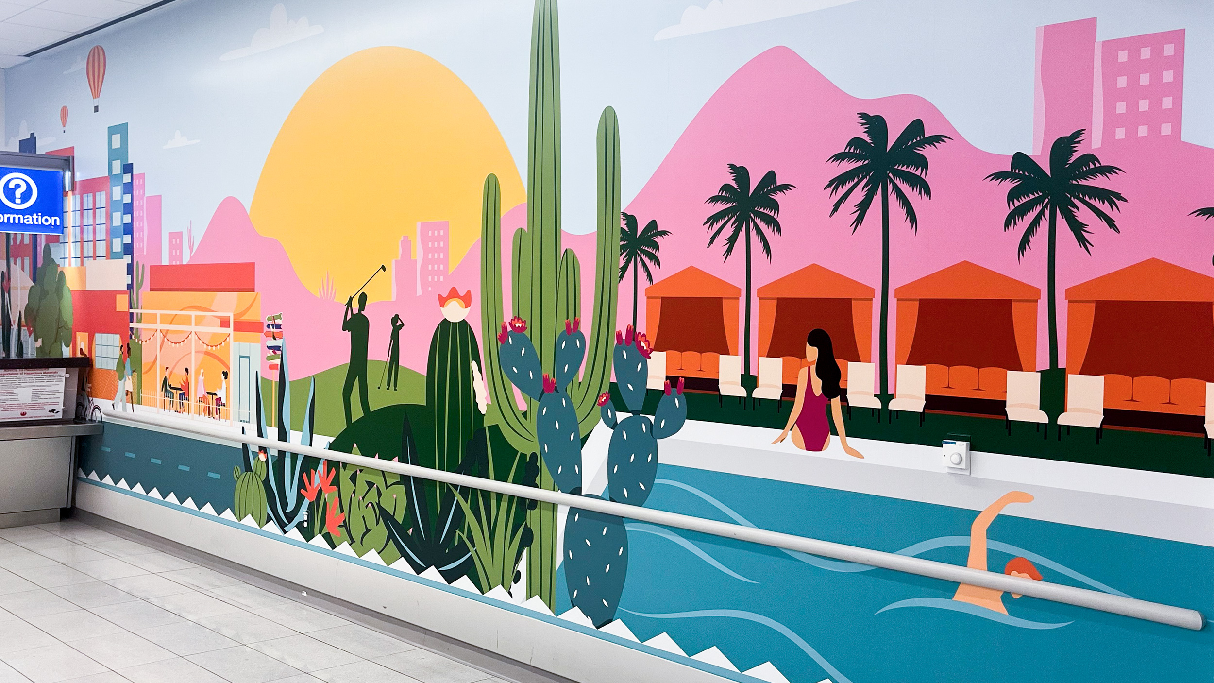 Visit Phoenix wall graphics, featuring a sunrise over a resort desert landscape