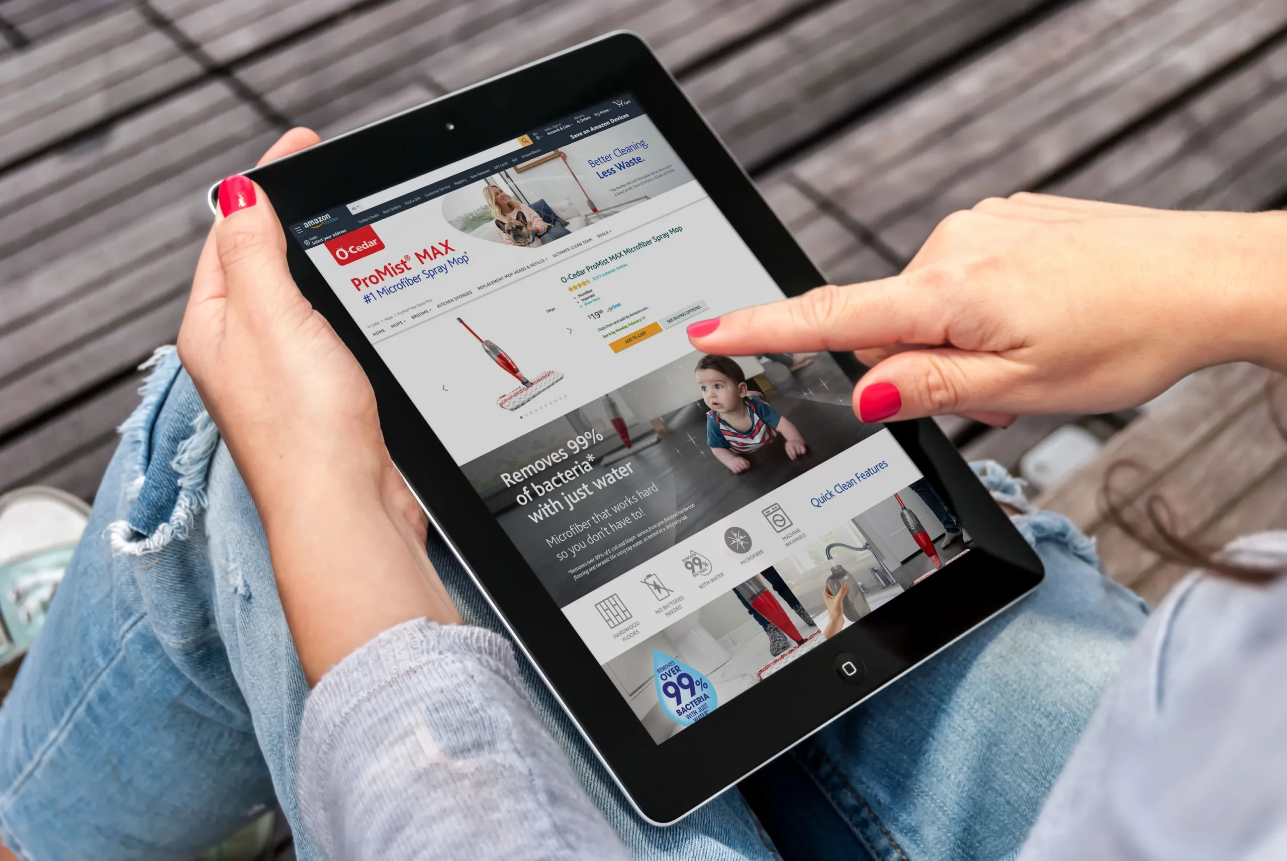 Close up of woman browsing the O-Cedar Amazon Store on an iPad