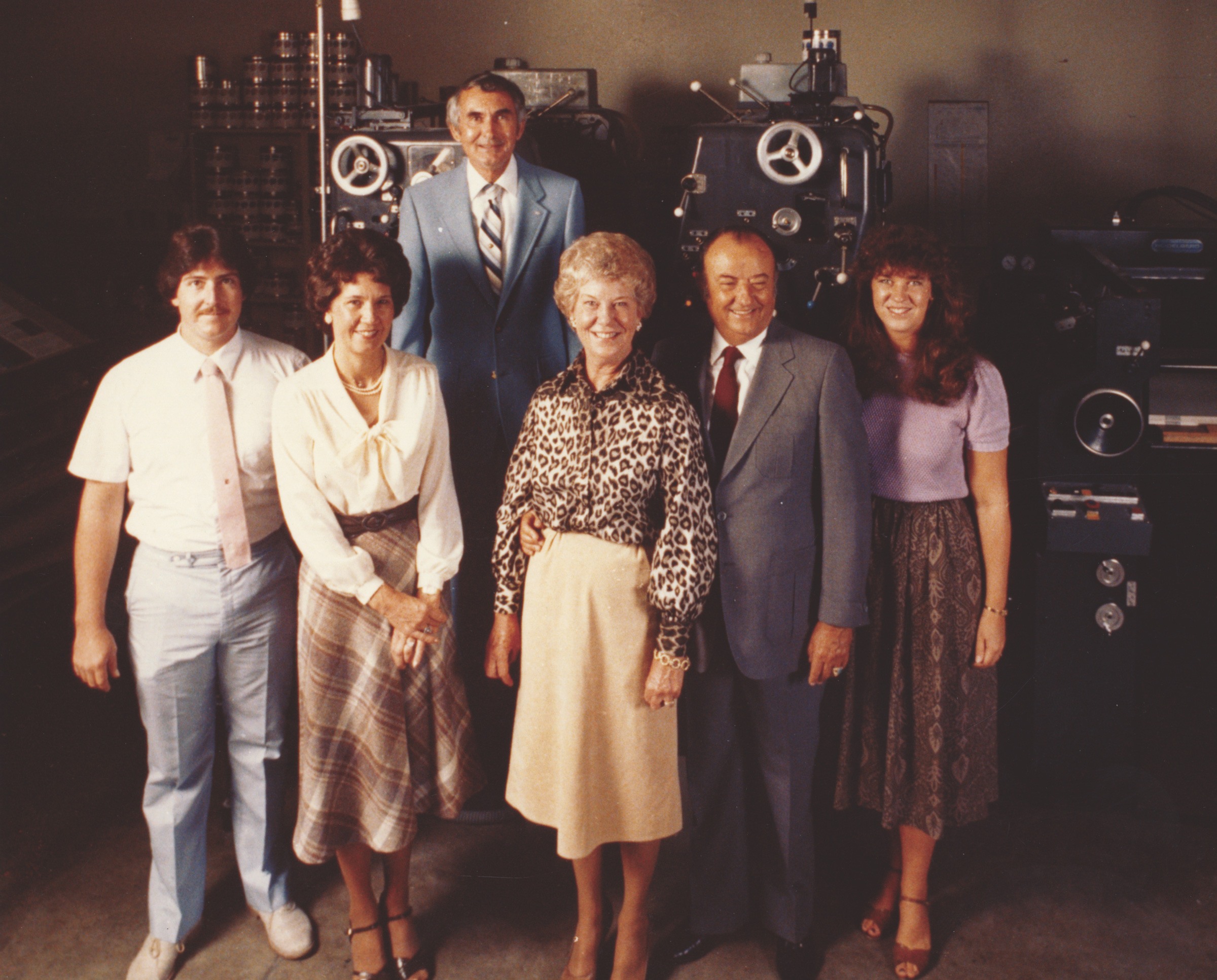 Historical photo of O'Neil team posing in the print shop