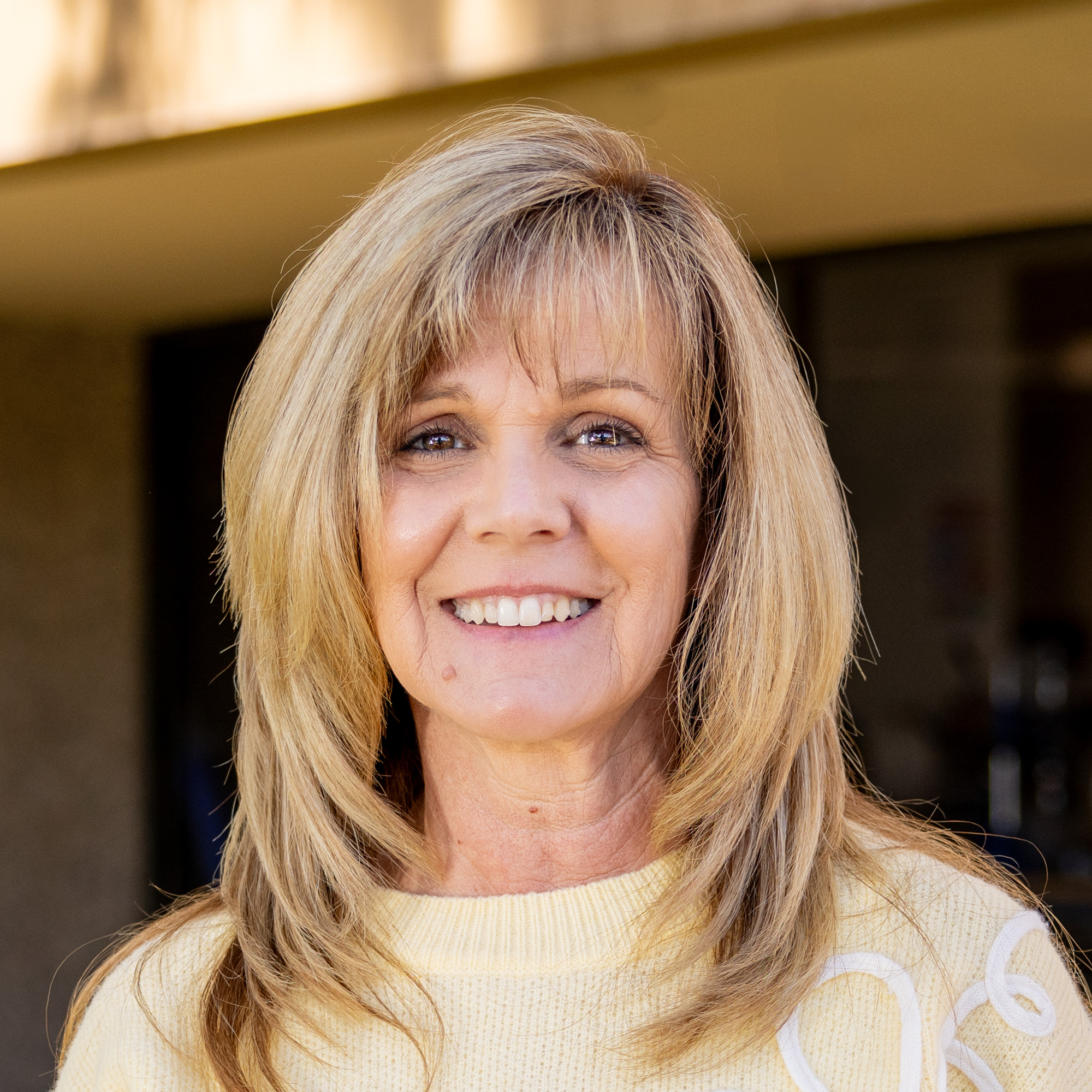 Karen smiling outdoors